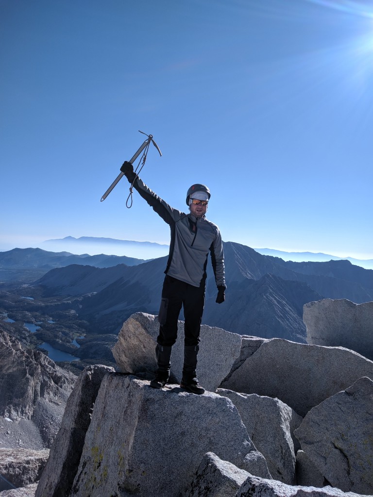 Pasha Gilchuk on the summit of Mt. Dade. Photo credit Andrew Kiselev.