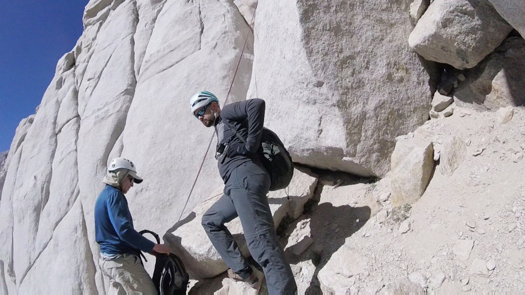 Andrew Kiselev and Rodion Turuikhan preparing to climb around “Chockstone”. 