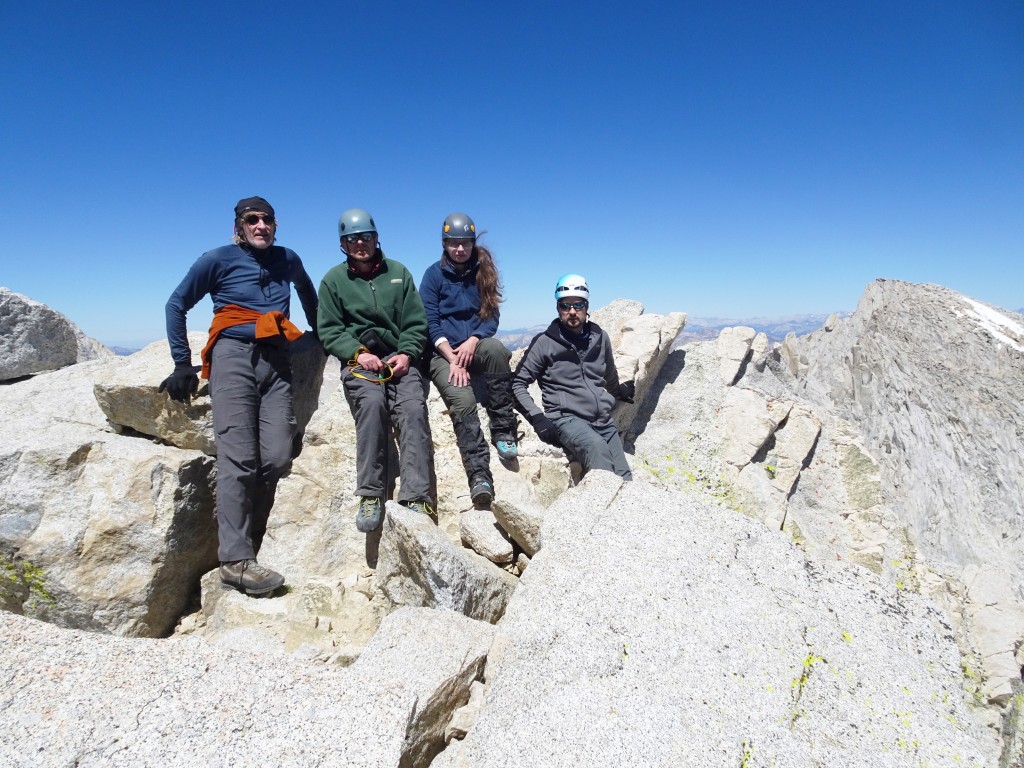 The summit of mt. Dade, 13,600 ft. Sergey Los, Alexander Bukreyev, Nadiya Teplyuk, Rodion Turuikhan (left to right). Photo credit Oleg Shakhtmeyster.